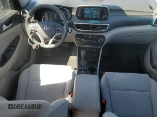2019 Hyundai Tucson Value with VIN KM8J33A43KU888877, listed as a Copart auction lot 52191305 with 77,204 mi miles and Salvage title. Bid and sale history available at DreamBid. Image 8.