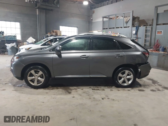 2015 Lexus RX 350 z VIN 2T2BK1BA9FC301567, wystawiony jako IAAI lot #42334065 z przebiegiem 129 779 mil mil oraz . Historia ofert i sprzedaży dostępna na DreamBid. Obrazek 14.