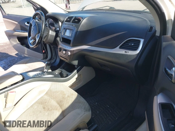 2013 Dodge Journey SXT with VIN 3C4PDCBG1DT563727, listed as a IAAI auction lot 42003852 with 202,516 mi miles and . Bid and sale history available at DreamBid. Image 5.