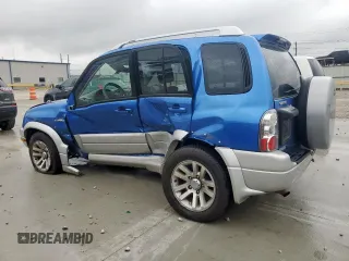 2005 Suzuki Grand Vitara LX with VIN JS3TD62V354200952, listed as a Copart auction lot 60374465 with 134,957 mi miles and Salvage title. Bid and sale history available at DreamBid. Image 2.