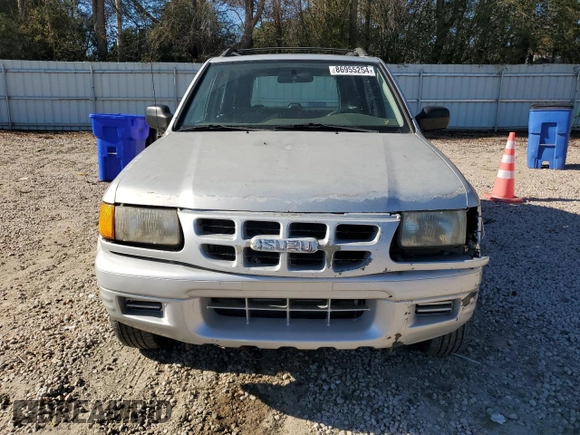 1999 Isuzu Rodeo S with VIN 4S2CK58W7X4357910, listed as a Copart auction lot 86955254 with 105,593 mi miles and Salvage Title. Bid and sale history available at DreamBid. Image 5.