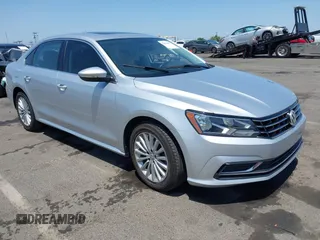 2017 Volkswagen Passat SE z VIN 1VWBT7A3XHC002069, wystawiony jako IAAI lot #42414967 z przebiegiem 139 565 mil mil oraz . Historia ofert i sprzedaży dostępna na DreamBid. Obrazek 1.