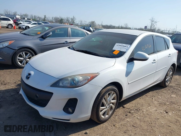 2012 Mazda Mazda3 i Touring with VIN JM1BL1L77C1628618, listed as a IAAI auction lot 42069661 with 201,942 mi miles. Bid and sale history available at carsss.com. Image 17.