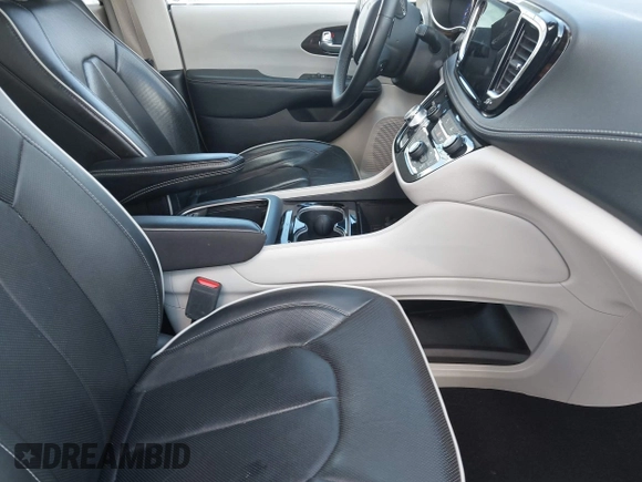 2023 Chrysler Pacifica Limited with VIN 2C4RC1GGXPR552354, listed as a IAAI auction lot 42275090 with 69,144 mi miles and . Bid and sale history available at DreamBid. Image 5.