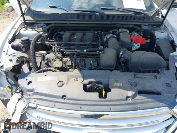 2014 Ford Taurus Limited with VIN 1FAHP2F8XEG181491, listed as a IAAI auction lot 40277144 with 107,374 mi miles. Bid and sale history available at carsss.com. Image 10.