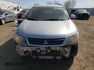2007 Mitsubishi Outlander LS z VIN JA4MT31X57Z012313, wystawiony jako Copart lot #48812055 z przebiegiem 139 066 mil mil oraz Szkoda całkowita • Salvage title. Historia ofert i sprzedaży dostępna na DreamBid. Obrazek 5.