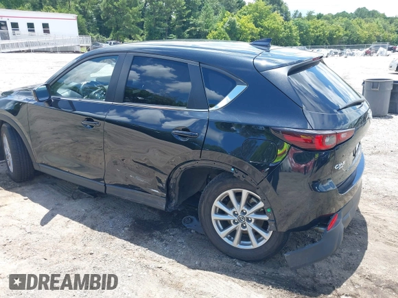 2023 Mazda CX-5 S Carbon Edition z VIN JM3KFBCMXP0201665, wystawiony jako IAAI lot #39965378 z przebiegiem 29 105 mil mil oraz . Historia ofert i sprzedaży dostępna na DreamBid. Obrazek 6.