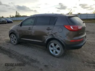 2013 Kia Sportage LX z VIN KNDPB3A23D7465413, wystawiony jako Copart lot #83694894 z przebiegiem 122 467 mil mil oraz Szkoda całkowita • Salvage title. Historia ofert i sprzedaży dostępna na DreamBid. Obrazek 2.