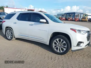 2018 Chevrolet Traverse Premier with VIN 1GNEVJKW5JJ192937, listed as a IAAI auction lot 42650759 with 95,378 mi miles and . Bid and sale history available at DreamBid. Image 1.