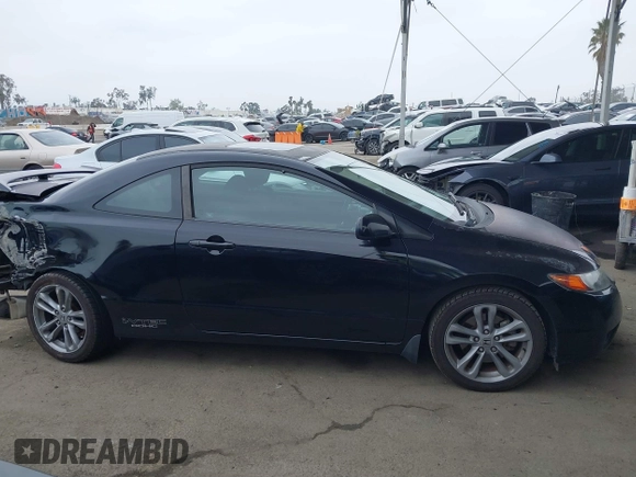 2007 Honda Civic Si with VIN 2HGFG21597H711439, listed as a IAAI auction lot 41891725 with 154,844 mi miles and . Bid and sale history available at DreamBid. Image 14.