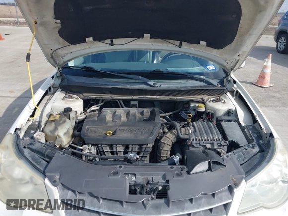 2008 Chrysler Sebring with VIN 1C3LC66J68N284521, listed as a IAAI auction lot 41508199 with 217,216 mi miles and . Bid and sale history available at DreamBid. Image 10.