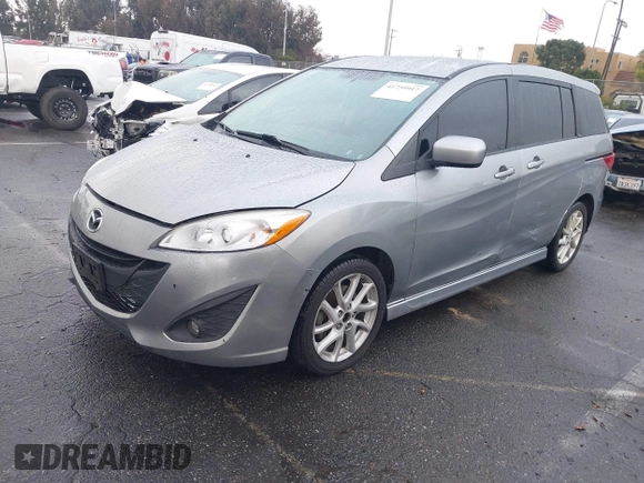 2012 Mazda 5 Touring с VIN JM1CW2CLXC0126576, выставлен на аукционе IAAI как лот 41759917 с пробегом 144 596 миль миль и . История ставок и продаж доступна на DreamBid. Изображение 2.
