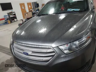 2015 Ford Taurus SEL with VIN 1FAHP2E87FG207029, listed as a IAAI auction lot 41752890 with 119,858 mi miles and . Bid and sale history available at carsss.com. Image 12.