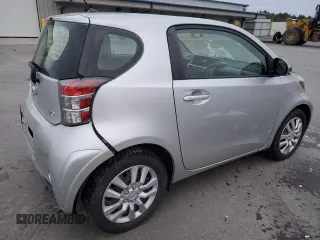 2012 Scion iQ with VIN JTNJJXB03CJ018641, listed as a Copart auction lot 82653104 with 118,617 mi miles and Salvage Title. Bid and sale history available at carsss.com. Image 3.