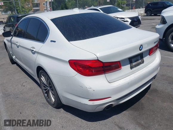 2018 BMW 5 Series 530e with VIN WBAJA9C58JB252868, listed as a IAAI auction lot 42323949 with 100,530 mi miles and . Bid and sale history available at DreamBid. Image 3.