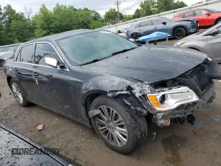 2012 Chrysler 300 C with VIN 2C3CCAKT9CH278272, listed as a Copart auction lot 61398504 with 119,190 mi miles and Salvage Title. Bid and sale history available at DreamBid. Image 4.