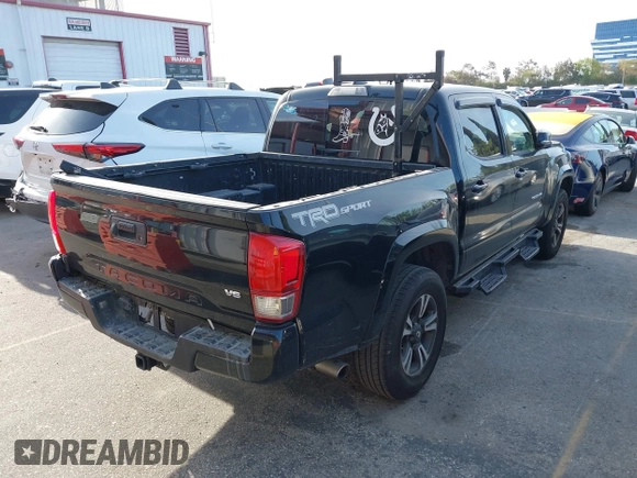 2017 Toyota Tacoma SR5 with VIN 5TFAZ5CN0HX053573, listed as a IAAI auction lot 41797867 with 102,628 mi miles and . Bid and sale history available at DreamBid. Image 4.