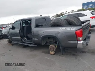 2017 Toyota Tacoma SR5 with VIN 3TMDZ5BN1HM021526, listed as a IAAI auction lot 42204091 with 82,802 mi miles and . Bid and sale history available at DreamBid. Image 15.