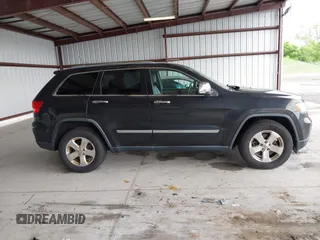 2012 Jeep Grand Cherokee Limited z VIN 1C4RJFBT1CC312006, wystawiony jako IAAI lot #42247170 z przebiegiem 233 890 mil mil oraz . Historia ofert i sprzedaży dostępna na DreamBid. Obrazek 13.