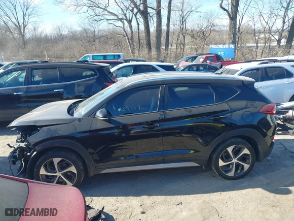 2017 Hyundai Tucson Value with VIN KM8J33A24HU343231, listed as a IAAI auction lot 41395327 with 133,017 mi miles. Bid and sale history available at carsss.com. Image 15.