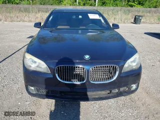2011 BMW 7 Series 740i with VIN WBAKA4C52BC392112, listed as a IAAI auction lot 41736939 with 125,953 mi miles. Bid and sale history available at carsss.com. Image 6.
