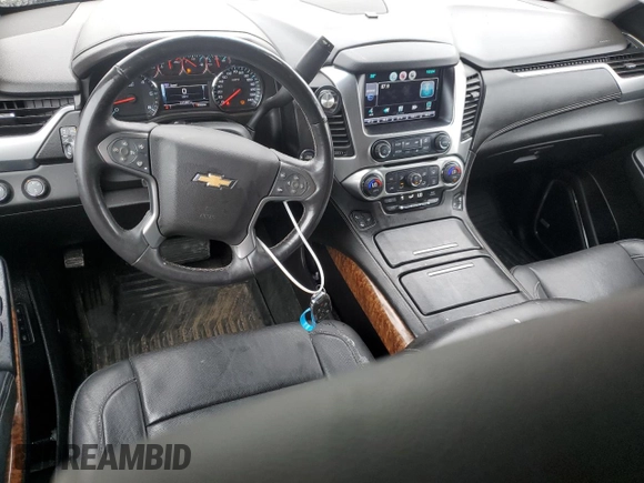 2015 Chevrolet Tahoe LTZ z VIN 1GNSKCKC5FR100084, wystawiony jako Copart lot #57677825 z przebiegiem 141 987 mil mil oraz Czysty tytuł • Clean title. Historia ofert i sprzedaży dostępna na DreamBid. Obrazek 8.