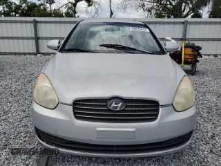 2009 Hyundai Accent Auto GLS z VIN KMHCN46C19U373167, wystawiony jako Copart lot #60026445 z przebiegiem 94 736 mil mil oraz Szkoda całkowita • Salvage title. Historia ofert i sprzedaży dostępna na DreamBid. Obrazek 5.