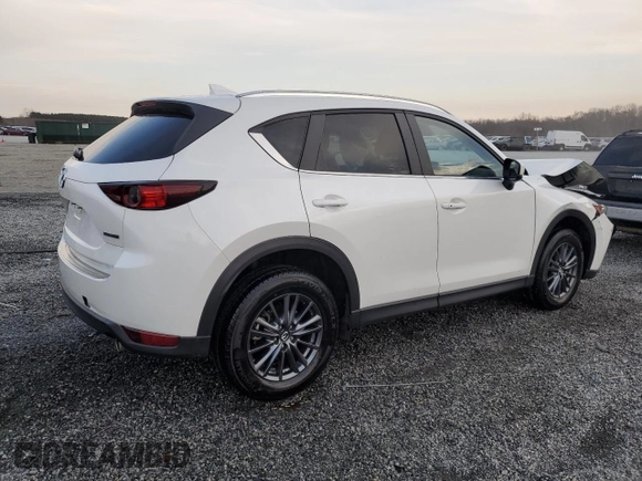 2020 Mazda CX-5 Touring with VIN JM3KFACM0L0863937, listed as a Copart auction lot 48240655 with 70,592 mi miles and Salvage Title. Bid and sale history available at carsss.com. Image 3.