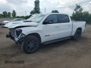2021 Ram 1500 Laramie with VIN 1C6SRFJT2MN766046, listed as a Copart auction lot 64253245 with 97,680 mi miles and Salvage title. Bid and sale history available at DreamBid. Image 1.