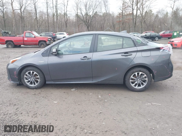2019 Toyota Prius L Eco z VIN JTDKARFU7K3077941, wystawiony jako IAAI lot #41865759 z przebiegiem 254 612 mil mil oraz . Historia ofert i sprzedaży dostępna na DreamBid. Obrazek 14.