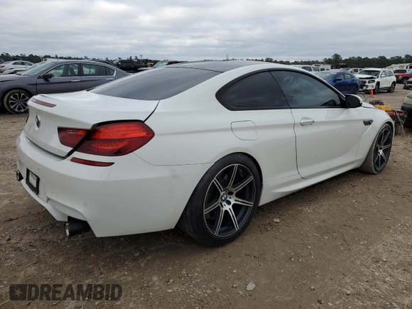 2014 BMW M6 z VIN WBSLX9C51ED160143, wystawiony jako Copart lot #88287015 z przebiegiem 91 717 mil mil oraz Szkoda całkowita • Salvage title. Historia ofert i sprzedaży dostępna na DreamBid. Obrazek 3.
