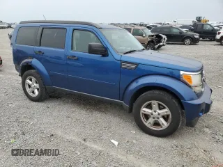 2009 Dodge Nitro SE with VIN 1D8GT28KX9W533248, listed as a Copart auction lot 70500994 with 124,091 mi miles and Salvage Title. Bid and sale history available at DreamBid. Image 4.
