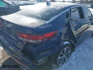 2016 Kia Optima SXL Turbo with VIN 5XXGV4L2XGG014565, listed as a IAAI auction lot 41213545 with 112,166 mi miles. Bid and sale history available at carsss.com. Image 6.