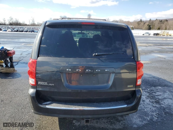 2012 Dodge Grand Caravan SXT with VIN 2C4RDGCG1CR197297, listed as a Copart auction lot 44719835 with 125,716 mi miles and Salvage Title. Bid and sale history available at carsss.com. Image 6.
