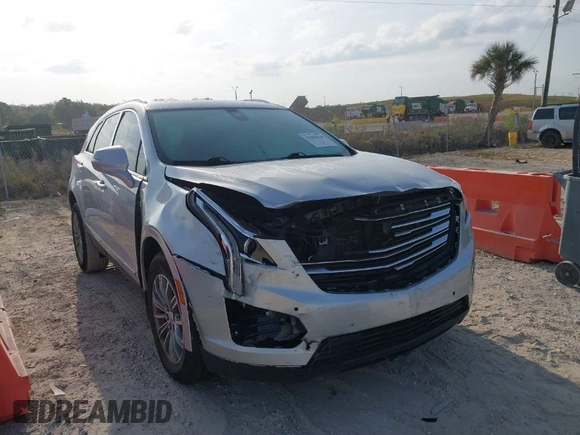 2017 Cadillac XT5 Luxury FWD with VIN 1GYKNBRS8HZ205769, listed as a IAAI auction lot 41865624 with 112,767 mi miles. Bid and sale history available at carsss.com. Image 1.