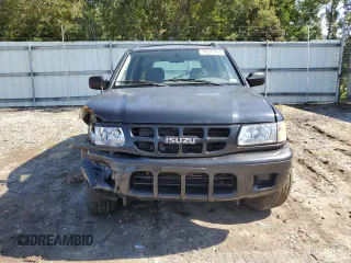 2002 Isuzu Rodeo S z VIN 4S2CK58W924321032, wystawiony jako Copart lot #66145264 z przebiegiem 184 325 mil mil oraz Szkody całkowita. Historia ofert i sprzedaży dostępna na DreamBid. Obrazek 5.