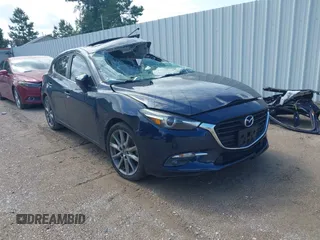 2018 Mazda 3 Grand Touring z VIN 3MZBN1M35JM179930, wystawiony jako IAAI lot #42542717 z przebiegiem Nie podano mil oraz . Historia ofert i sprzedaży dostępna na DreamBid. Obrazek 1.