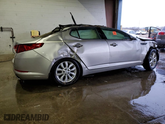 2013 Kia Optima EX с VIN 5XXGN4A70DG239393, выставлен на аукционе Copart как лот 41923615 с пробегом Не указан миль и Списание • Salvage title. История ставок и продаж доступна на DreamBid. Изображение 3.