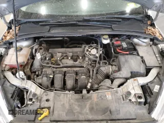 2018 Ford Focus SE z VIN 1FADP3F24JL315154, wystawiony jako Copart lot #53609185 z przebiegiem 76 216 mil mil oraz Szkoda całkowita • Salvage title. Historia ofert i sprzedaży dostępna na DreamBid. Obrazek 11.