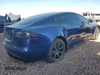 2023 Tesla Model S with VIN 5YJSA1E57PF498760, listed as a Copart auction lot 88494905 with 39,521 mi miles and Salvage title. Bid and sale history available at DreamBid. Image 3.