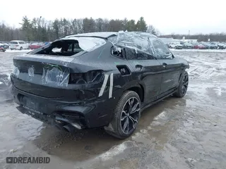 2020 BMW X4 M with VIN 5YMUJ0C01LLU67190, listed as a IAAI auction lot 41669132 with 55,609 mi miles. Bid and sale history available at carsss.com. Image 4.