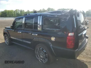 2010 Jeep Commander Limited with VIN 1J4RG5GT1AC129682, listed as a Copart auction lot 55215375 with 36,906 mi miles and Salvage title. Bid and sale history available at DreamBid. Image 2.