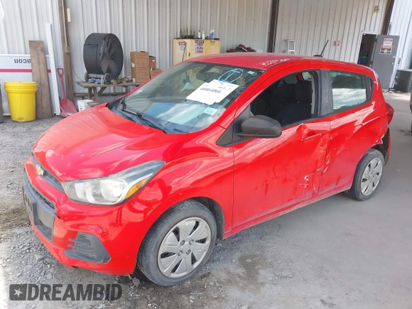 2016 Chevrolet Spark LS with VIN KL8CB6SA6GC588083, listed as a IAAI auction lot 40064066 with 123,217 mi miles. Bid and sale history available at carsss.com. Image 2.