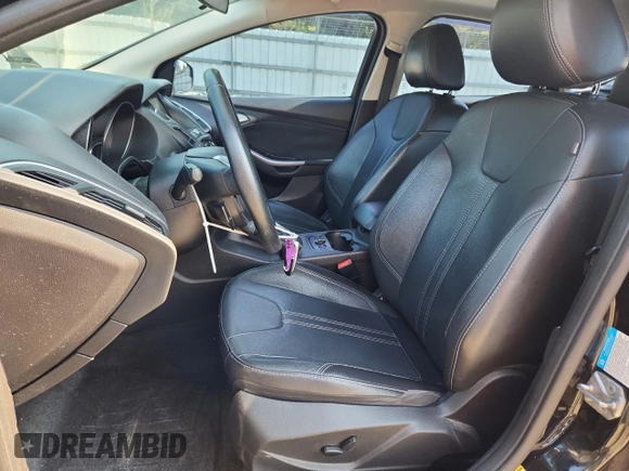 2014 Ford Focus Titanium with VIN 1FADP3N21EL274263, listed as a Copart auction lot 64017905 with 211,775 mi miles and Clean title. Bid and sale history available at DreamBid. Image 7.