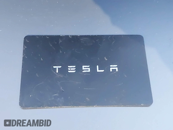 2021 Tesla Model Y Performance with VIN 5YJYGDEF6MF252877, listed as a IAAI auction lot 41770770 with 58,550 mi miles and . Bid and sale history available at DreamBid. Image 11.