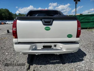 2010 Chevrolet Avalanche LTZ with VIN 3GNVKGE09AG250035, listed as a Copart auction lot 58019804 with 193,509 mi miles and Salvage Title. Bid and sale history available at carsss.com. Image 6.