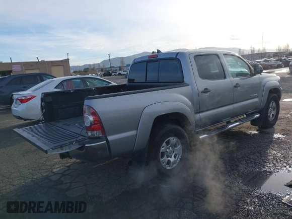 2014 Toyota Tacoma PreRunner with VIN 3TMJU4GN0EM163253, listed as a IAAI auction lot 41559780 with 155,883 mi miles. Bid and sale history available at carsss.com. Image 4.