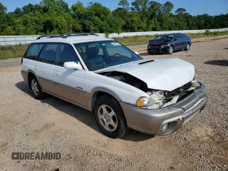 1999 Subaru Legacy Outback with VIN 4S3BG6850X7649578, listed as a Copart auction lot 56654155 with 174,651 mi miles and Salvage title. Bid and sale history available at DreamBid. Image 4.