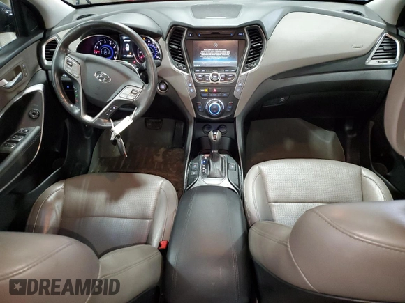 2014 Hyundai Santa Fe z VIN 5XYZUDLB0EG200376, wystawiony jako Copart lot #53634165 z przebiegiem 64 561 mil mil oraz Szkoda całkowita • Salvage title. Historia ofert i sprzedaży dostępna na DreamBid. Obrazek 8.