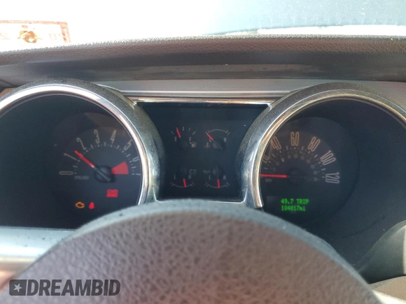 2005 Ford Mustang Deluxe с VIN 1ZVFT84N155227663, выставлен на аукционе Copart как лот 57402915 с пробегом 184 817 миль миль и Списание • Salvage title. История ставок и продаж доступна на DreamBid. Изображение 9.